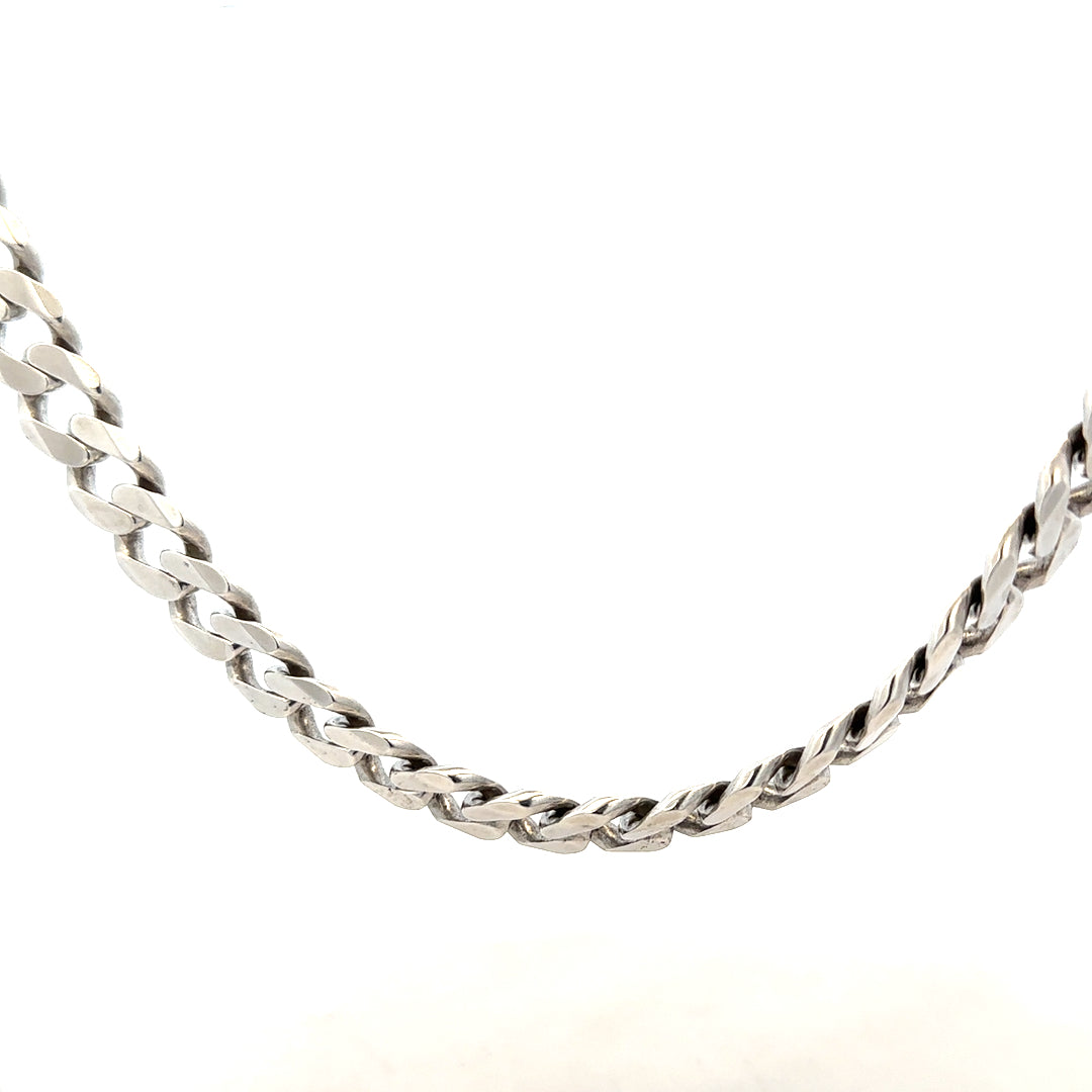 Silver curb chain weighing 94.7g, showcasing its sleek metallic links and sturdy design for jewelry or fashion accessories.