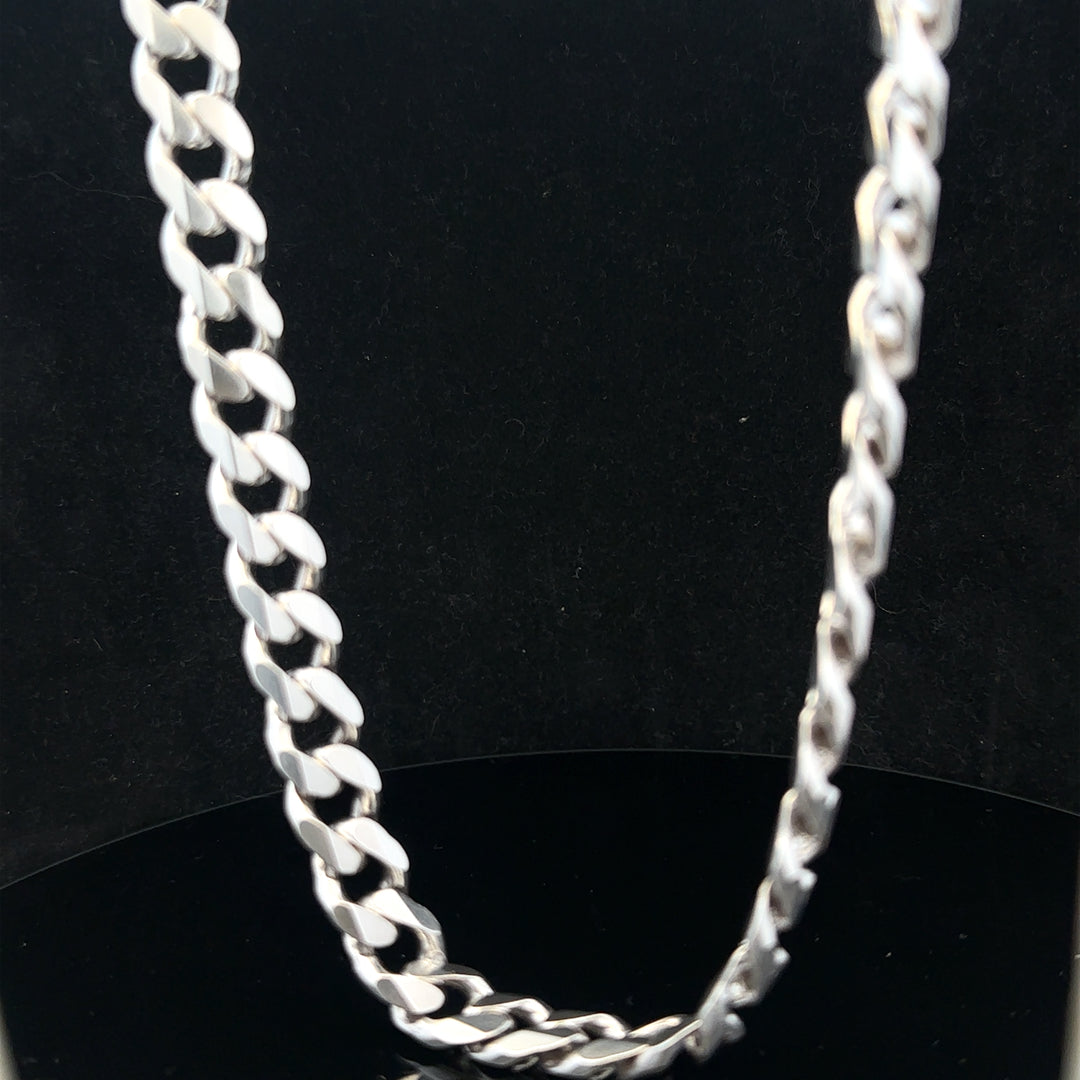 Silver curb chain weighing 95.2g, featuring a classic design with interlocking links, displayed on a plain background.