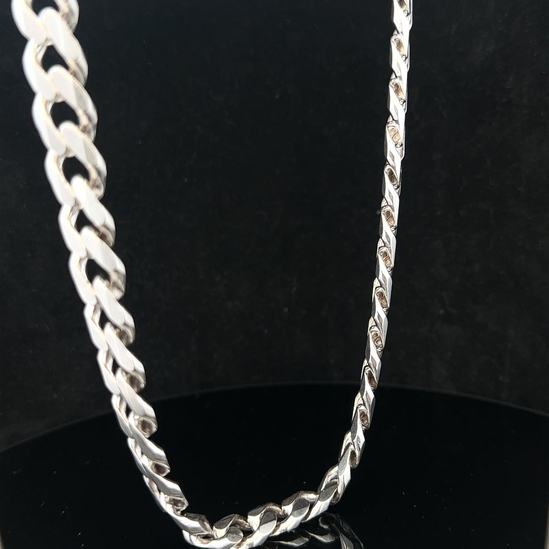 Silver curb chain weighing 95.2g, featuring classic links and a polished finish, ideal for jewelry or fashion accessories.