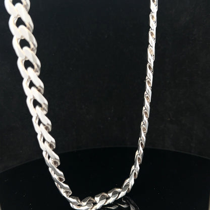 Silver curb chain weighing 95.2g, featuring classic links and a polished finish, ideal for jewelry or fashion accessories.