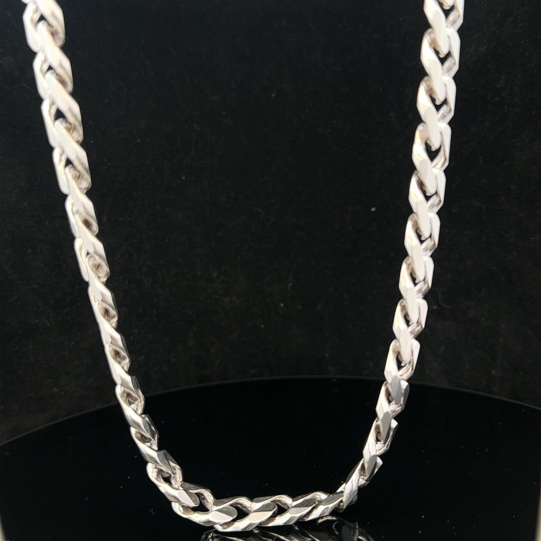 Silver curb chain weighing 95.2g with a classic design, displayed on a plain background showing its detailed links.