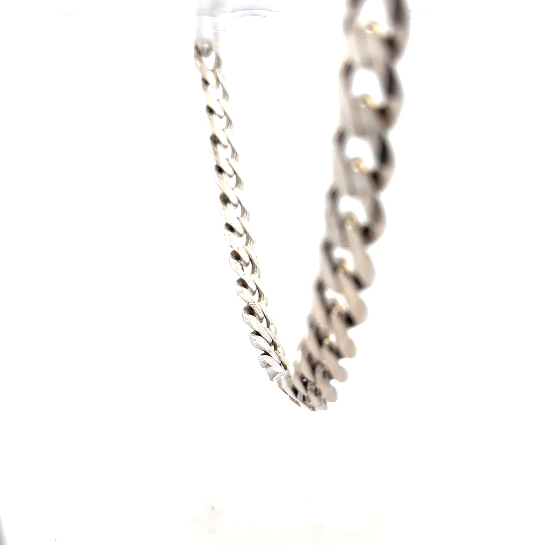 Silver curb chain weighing 96.3g, unbranded jewelry piece with a classic linked design, shown in a close-up image.