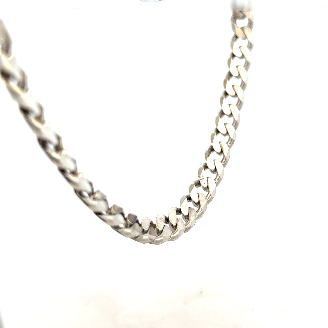 Silver curb chain weighing 96.3g, showcasing a detailed close-up of its linked design and polished finish.