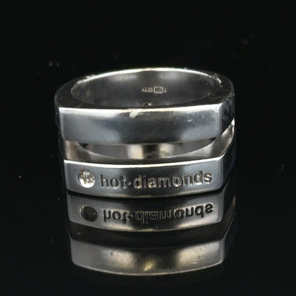 Silver hot diamond ring size R1/2 with sparkling diamonds, showcasing a close-up of the elegant jewelry piece.