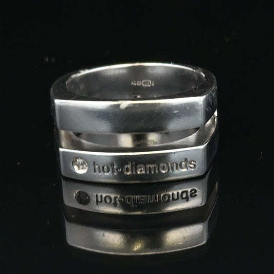 Silver hot diamond ring size R1/2 with sparkling diamonds, showcasing a close-up of the elegant jewelry piece.