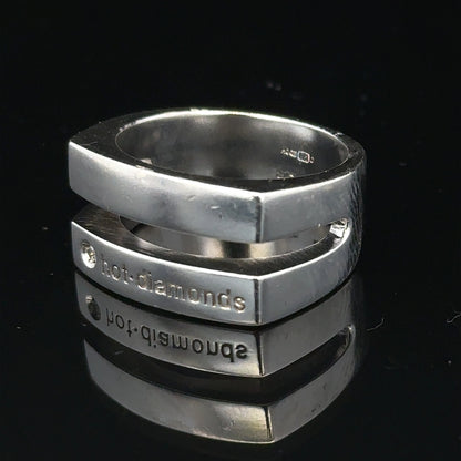 Silver hot diamond ring in size R1/2 featuring sparkling diamonds, crafted with a sleek band design.