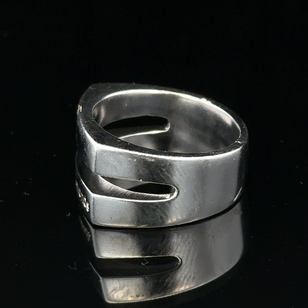 Silver hot diamond ring in size R1/2 with sparkling diamonds, showcasing a sleek and elegant jewelry design.