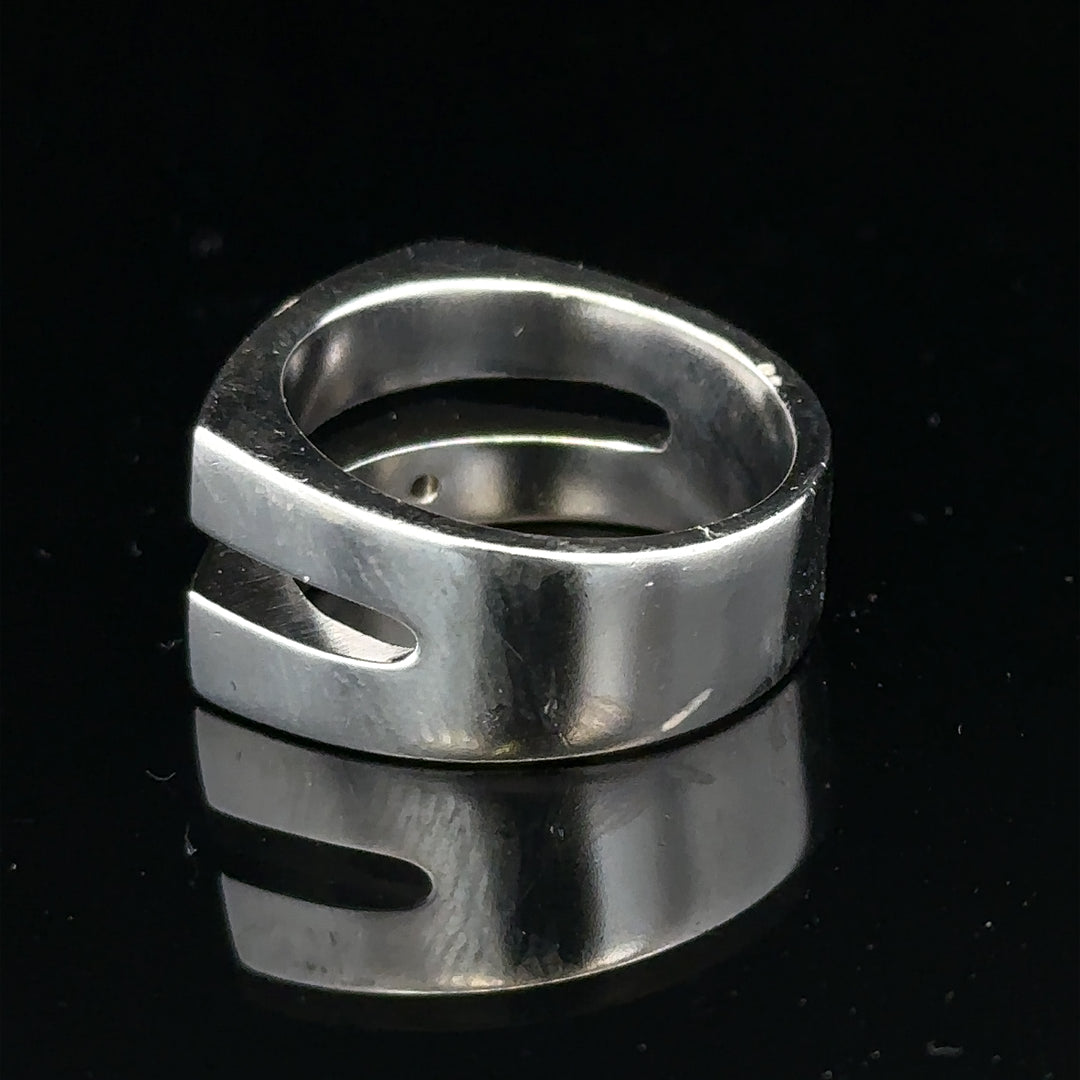 Silver hot diamond ring size R1/2 with sparkling diamonds, unbranded jewelry piece, close-up view of the elegant ring.