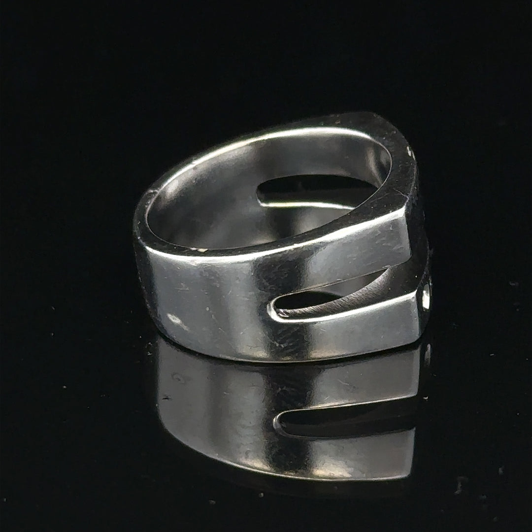 Silver hot diamond ring size R1/2 with sparkling diamonds, shown on a plain background, showcasing the elegant jewelry design.