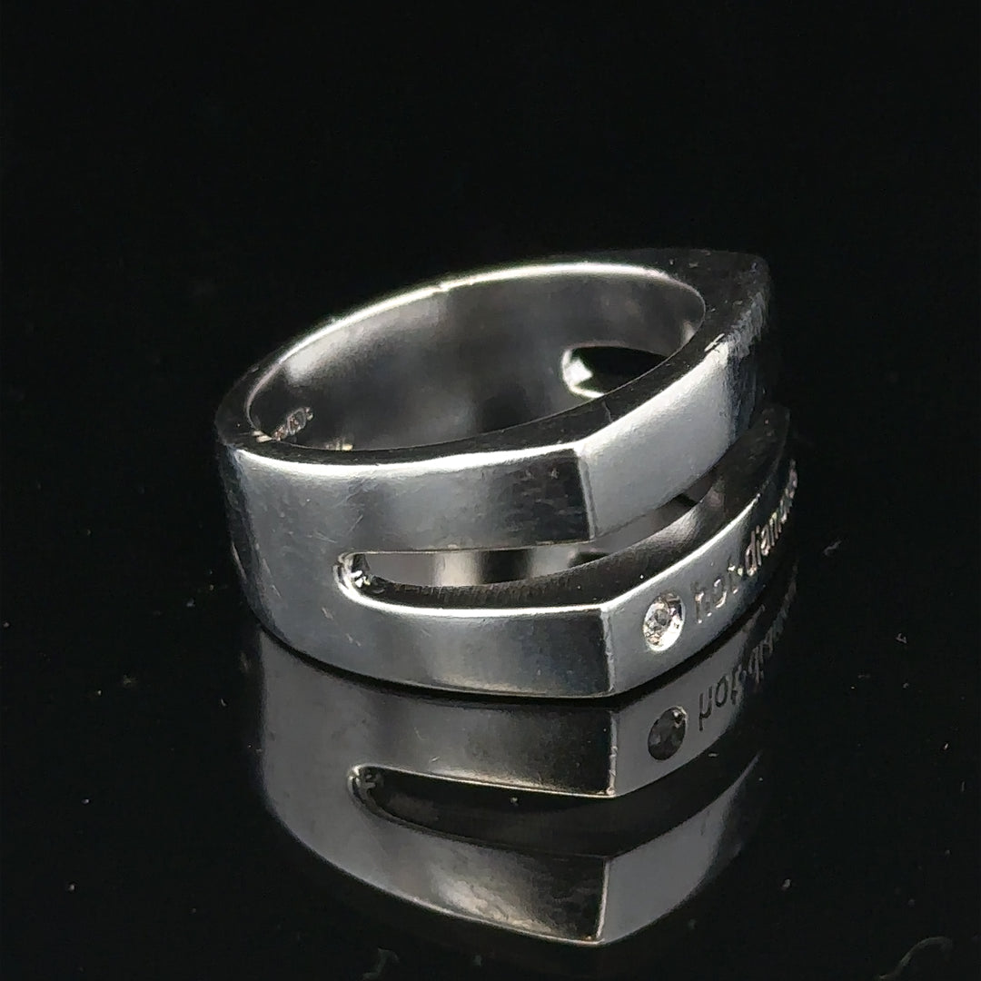 Silver hot diamond ring in size R1/2 featuring a sparkling diamond setting, designed for elegant jewelry wear.