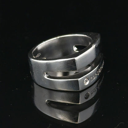Silver hot diamond ring in size R1/2 featuring a sparkling diamond setting, designed for elegant jewelry wear.