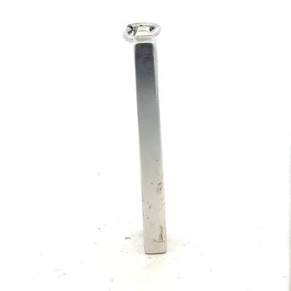 Silver ingot pendant, 31g, unbranded, with a smooth polished finish and rectangular shape, showcasing detailed craftsmanship.