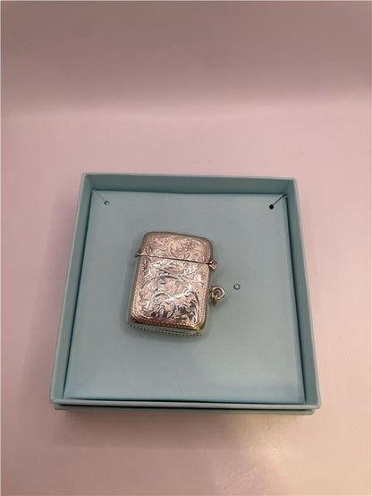 Silver match stick holder in 17.7g with a sleek design, ideal for storing and organizing matches.