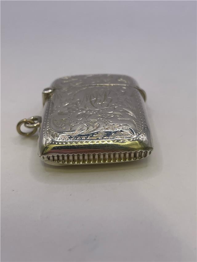 Silver match stick holder weighing 17.7g, unbranded, with a sleek metallic finish and compact design for safe storage.