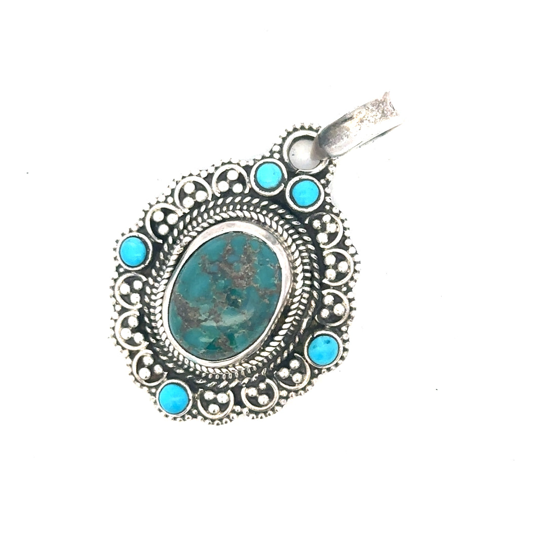 Silver pendant weighing 15.9g, unbranded, showcased with intricate design and polished finish for elegant jewelry styling.