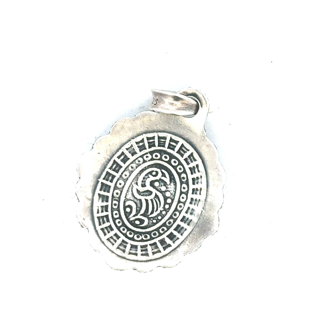 Silver pendant weighing 15.9g, crafted with a sleek design, displayed on a plain background for unbranded jewelry collection.