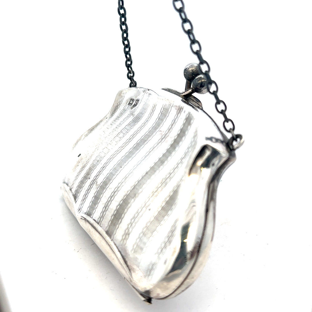 Silver purse weighing 66.2g with a sleek design, featuring a compact and stylish accessory for everyday use.