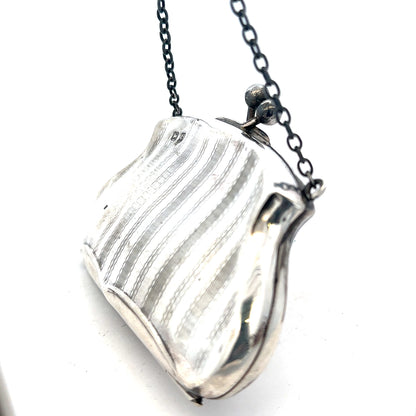 Silver purse weighing 66.2g with a sleek design, featuring a compact and stylish accessory for everyday use.
