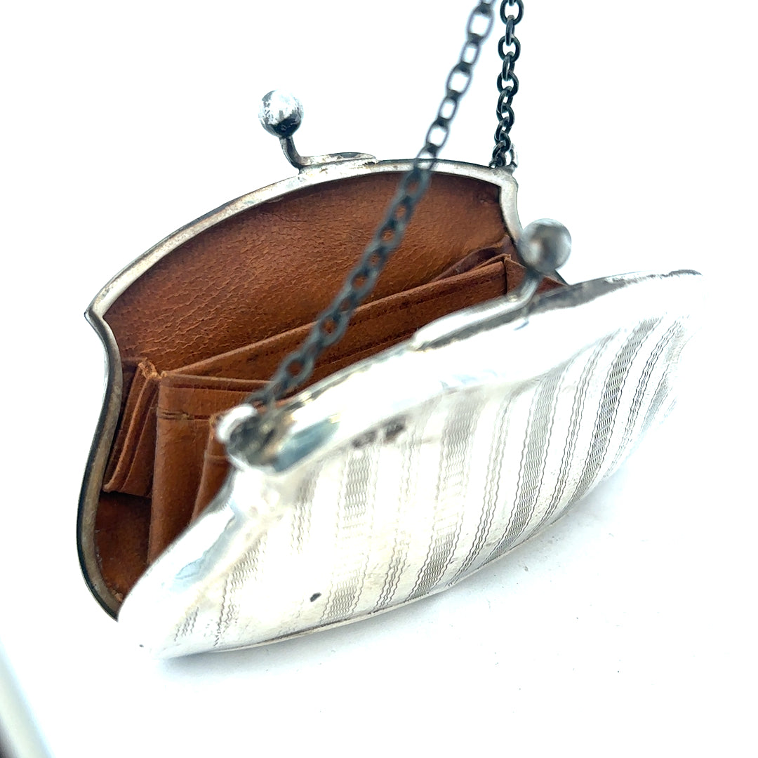 Silver purse weighing 66.2g with a sleek, compact design, perfect for carrying small essentials.