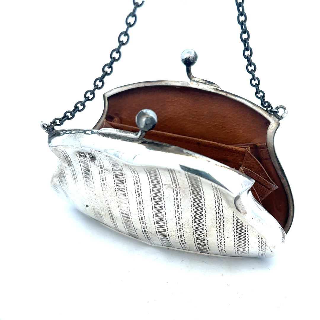 Silver purse weighing 66.2g with a sleek design, suitable for storing small personal items.