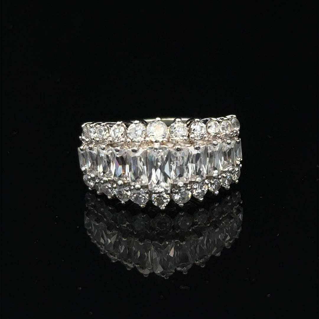 Silver ring in size P featuring a sleek design, displayed on a plain background. Unbranded jewelry accessory.