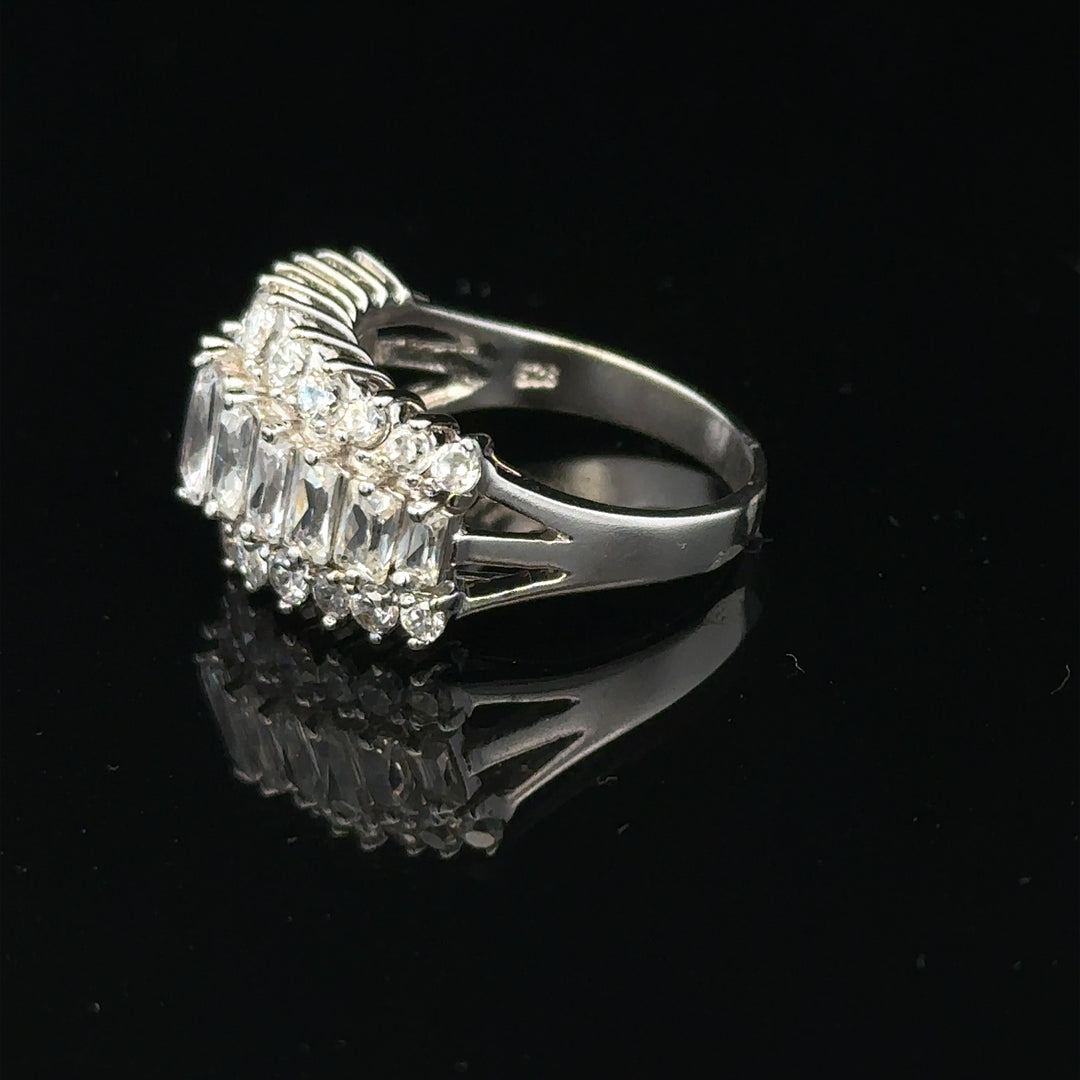 Silver ring size P with a simple, polished band featuring a smooth finish, perfect for everyday wear.