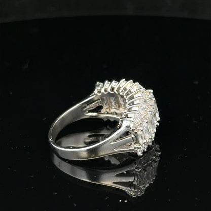 Silver ring size P with a smooth band, featuring a simple unbranded design, shown on a plain background.