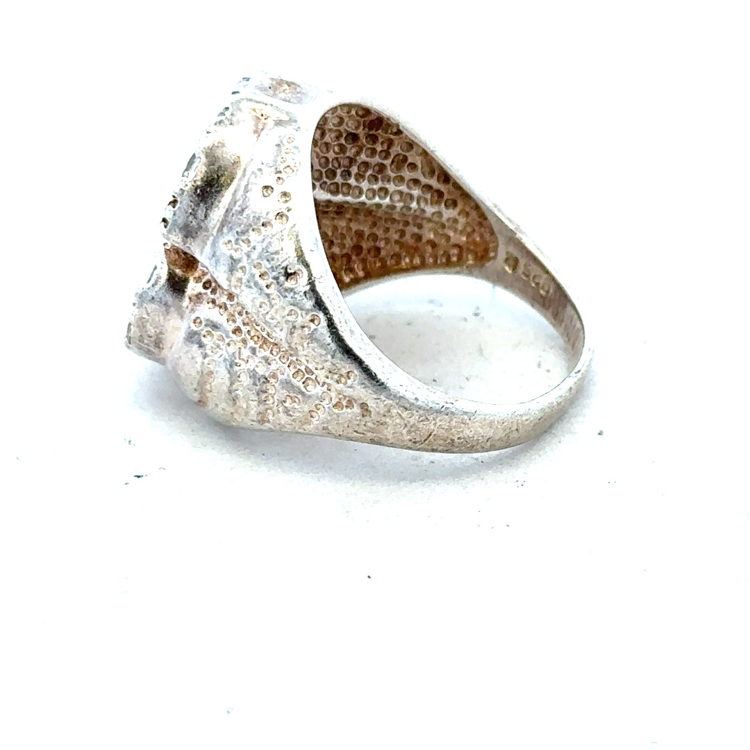 Silver ring size R, unbranded, featuring a sleek band design, shown on a plain white background.