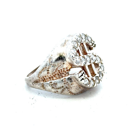 Silver ring size R with a sleek band, unbranded, shown close-up with detailed focus on the smooth silver surface.