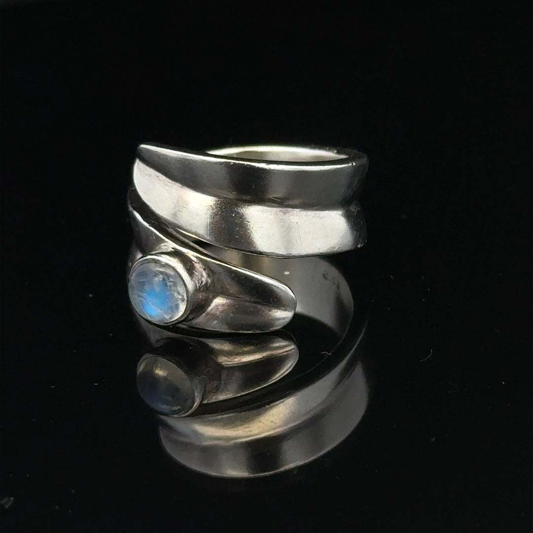 Silver ring size R with a smooth band, showcased on a white background, unbranded jewelry design.