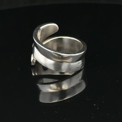Silver ring in size R with a smooth band, featuring a polished finish and simple design, ideal for everyday wear.