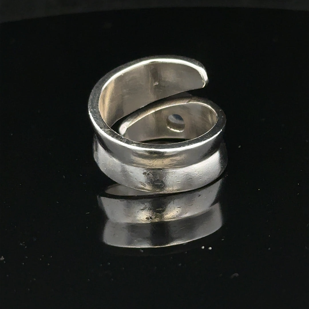 Silver ring in size R with a smooth band, unbranded, shown on a plain background in this product image.