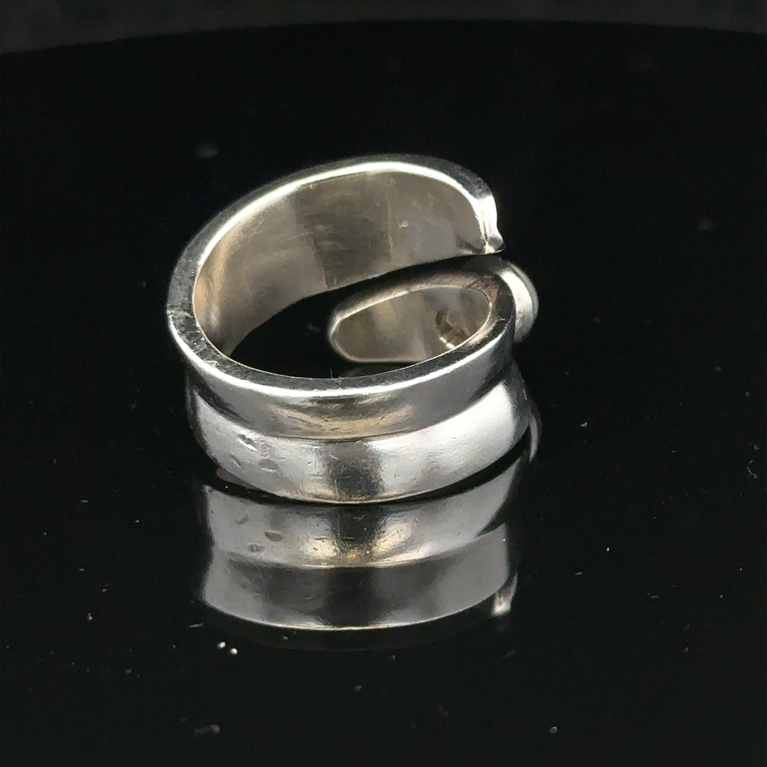 Silver ring in size R with a smooth band, featuring a polished finish and simple design, ideal for everyday wear.