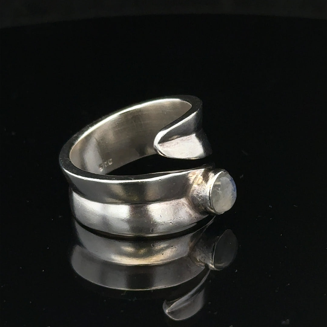Silver ring in size R with a smooth band, featuring a sleek unbranded design perfect for everyday wear.