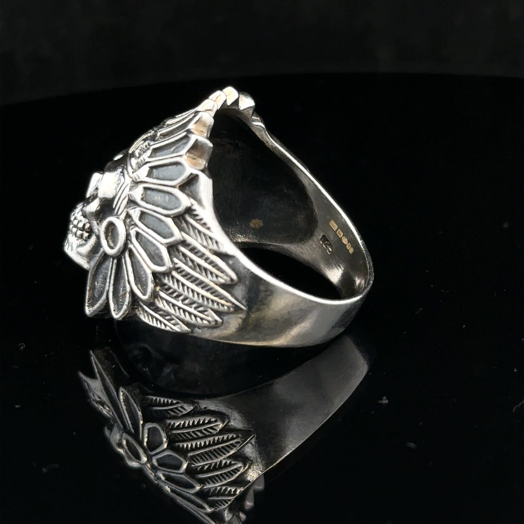 Silver ring in size Z with a smooth band, featured in a close-up image showing its polished finish and sleek design.