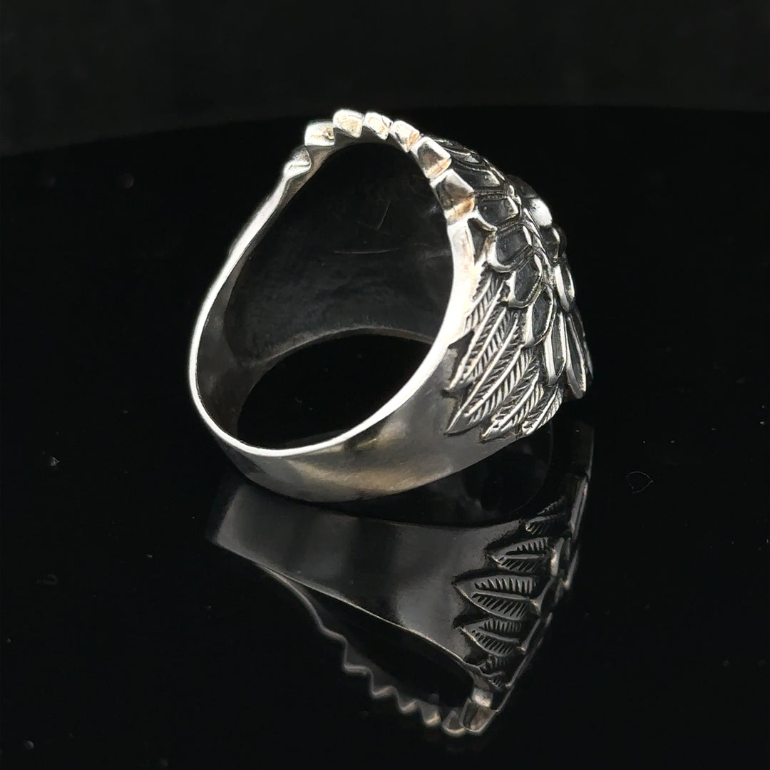 Silver ring size Z with a smooth band, unbranded jewelry piece, showcasing a polished silver finish and classic design.