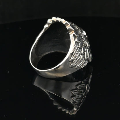 Silver ring size Z with a smooth band, unbranded jewelry piece, showcasing a polished silver finish and classic design.
