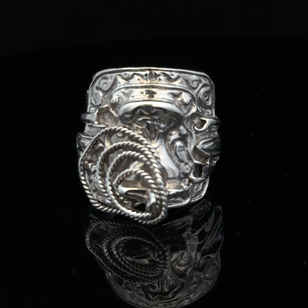 Silver saddle ring in size V, unbranded, with a smooth, polished finish and classic design, showcased on a plain background.
