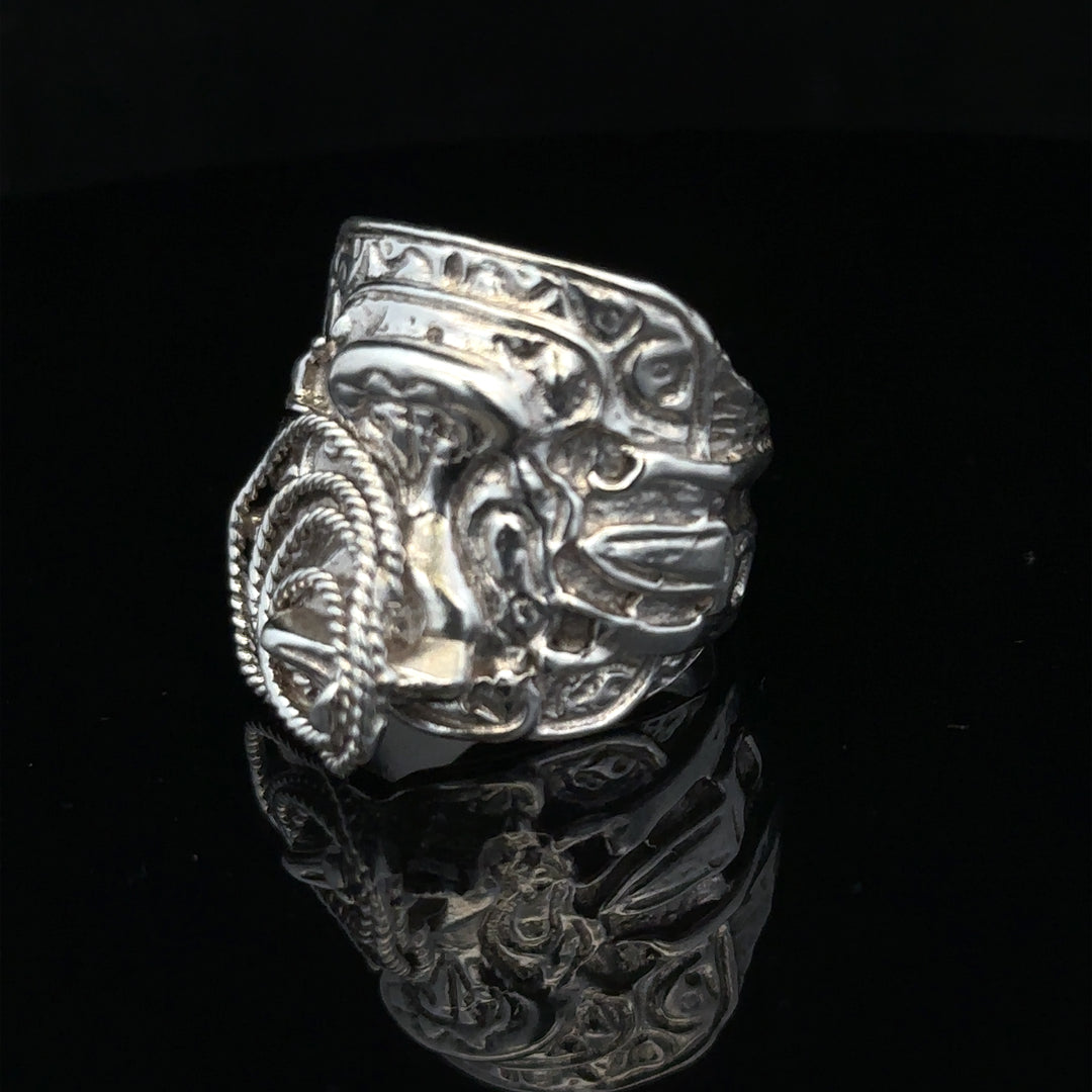 Silver saddle ring in size V with a smooth, polished design, crafted from unbranded silver metal.