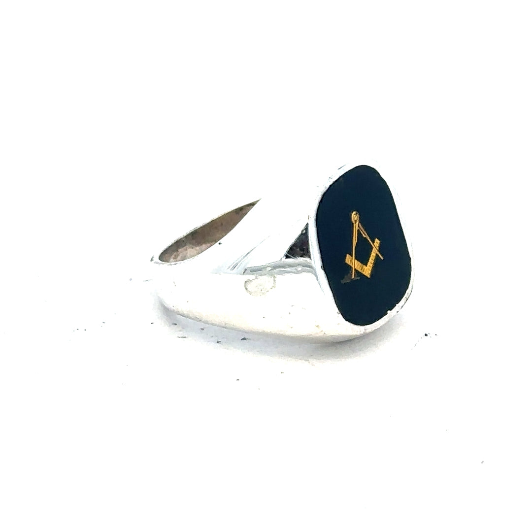 Silver signet ring size O with smooth polished surface, unbranded jewelry piece, displayed on a neutral background.