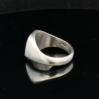 Silver signet ring in size V with a smooth, polished finish, crafted from unbranded silver metal.