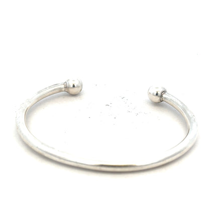 Silver torque bangle 20g, unbranded, with a sleek circular design and smooth finish, shown on a plain background.