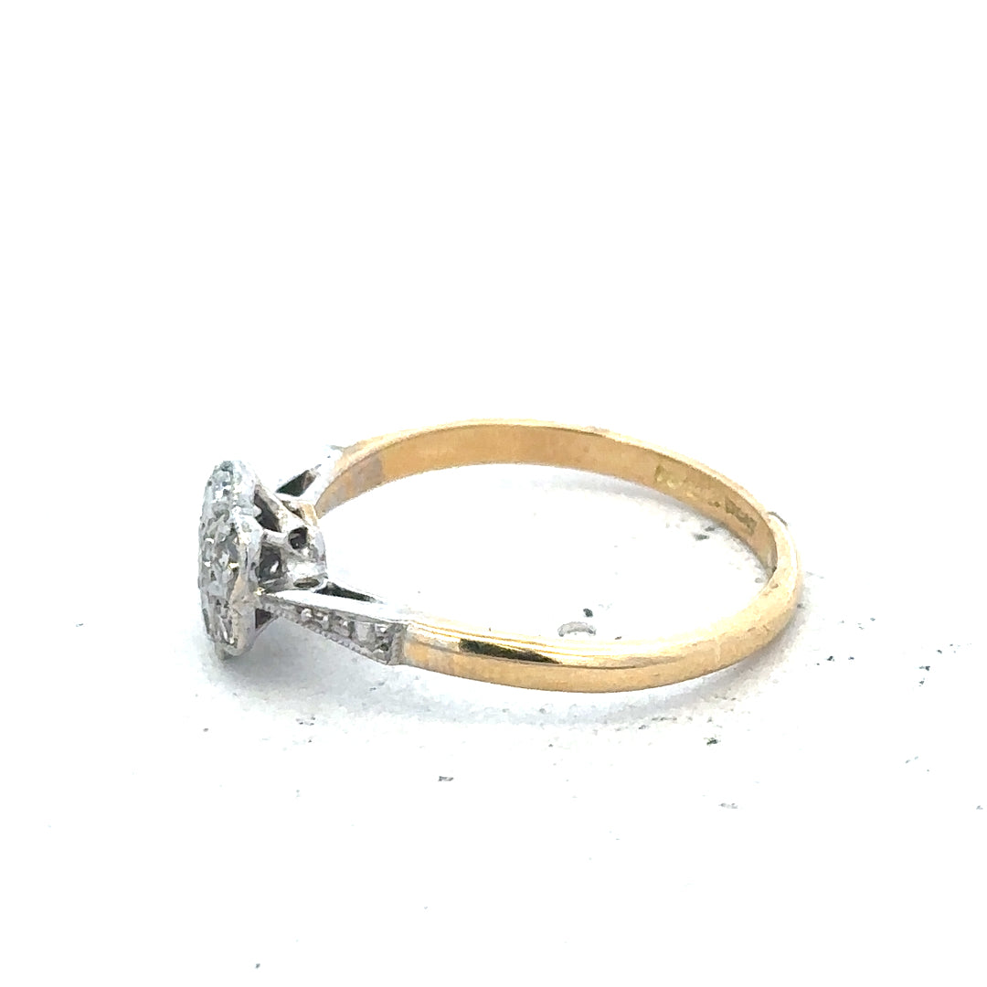 Vintage 18ct yellow gold and platinum diamond ring with intricate detailing and sparkling diamonds, unbranded jewelry piece.