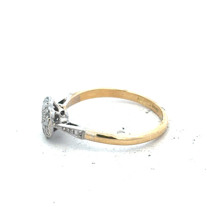 Vintage 18ct yellow gold and platinum diamond ring with intricate detailing and sparkling diamonds, unbranded jewelry piece.