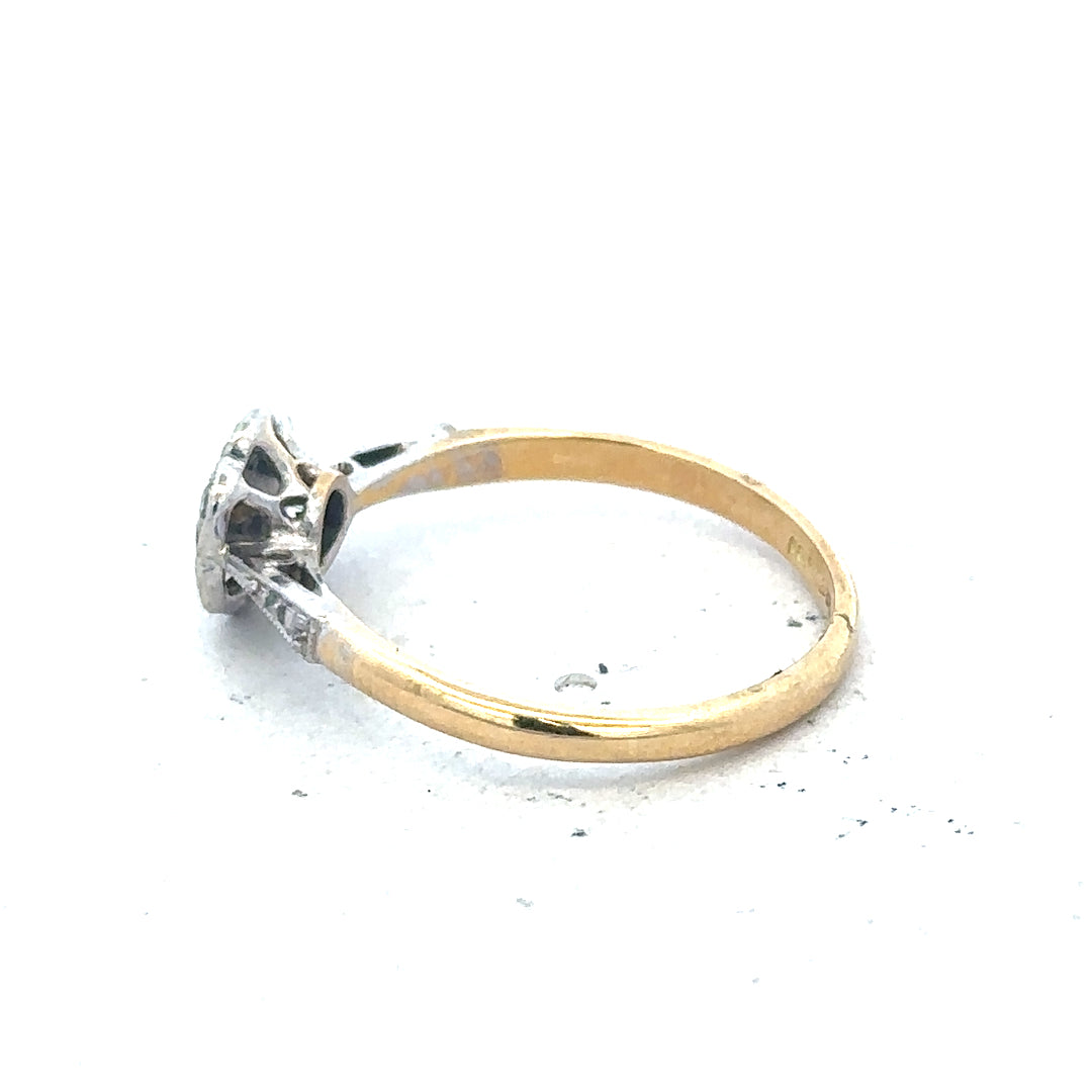 Vintage 18ct yellow gold and platinum diamond ring with intricate detailing, unbranded jewelry piece.