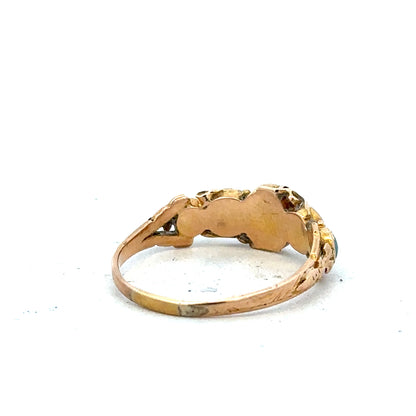 Vintage gold ring in size N, featuring a classic design, displayed on a neutral background showcasing its elegant style.